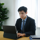 man working infront laptop