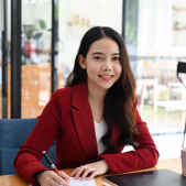 woman taking notes